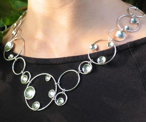 Spegelhalsband i silver, del av kollektion med ring, örhängen, armband
